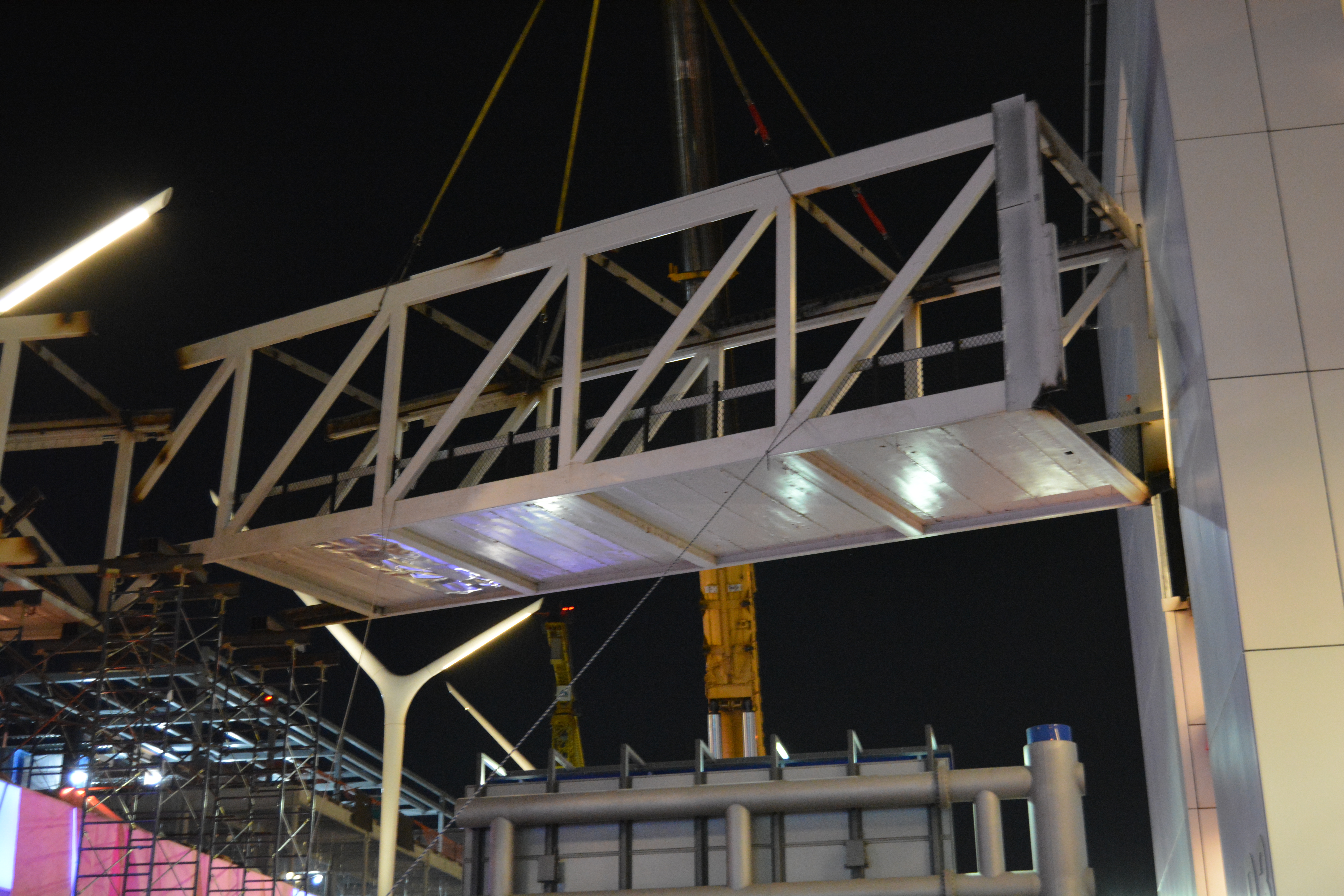 The pedestrian bridge connecting Terminal 3 and Parking Structure 3 being removed.