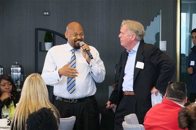 Edge4Vets Founder Tom Murphy (right) and an attending veteran discussthe importance ofbeing able to visualize the type of work one wants to perform before a job search.