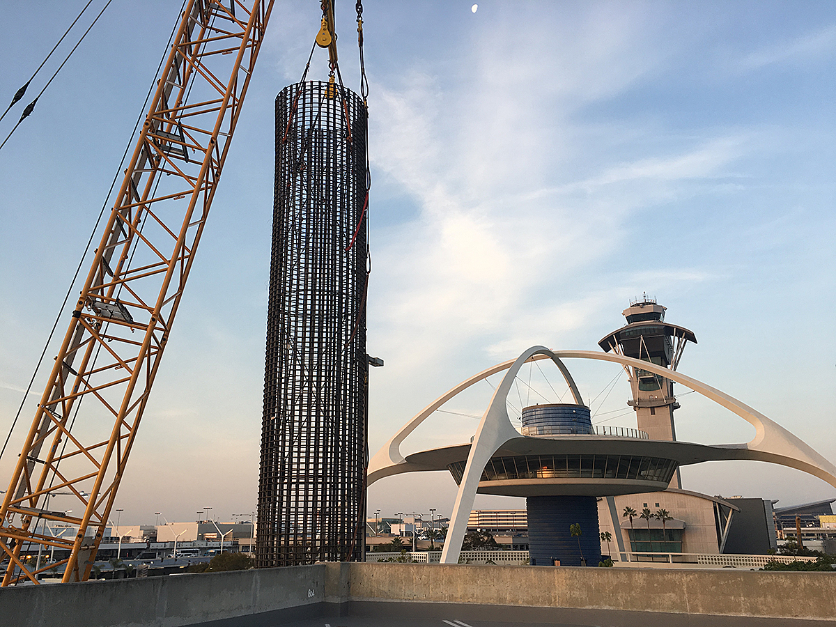 Foundation work for the Theme Building viewing platform begins in the Central Terminal Area.