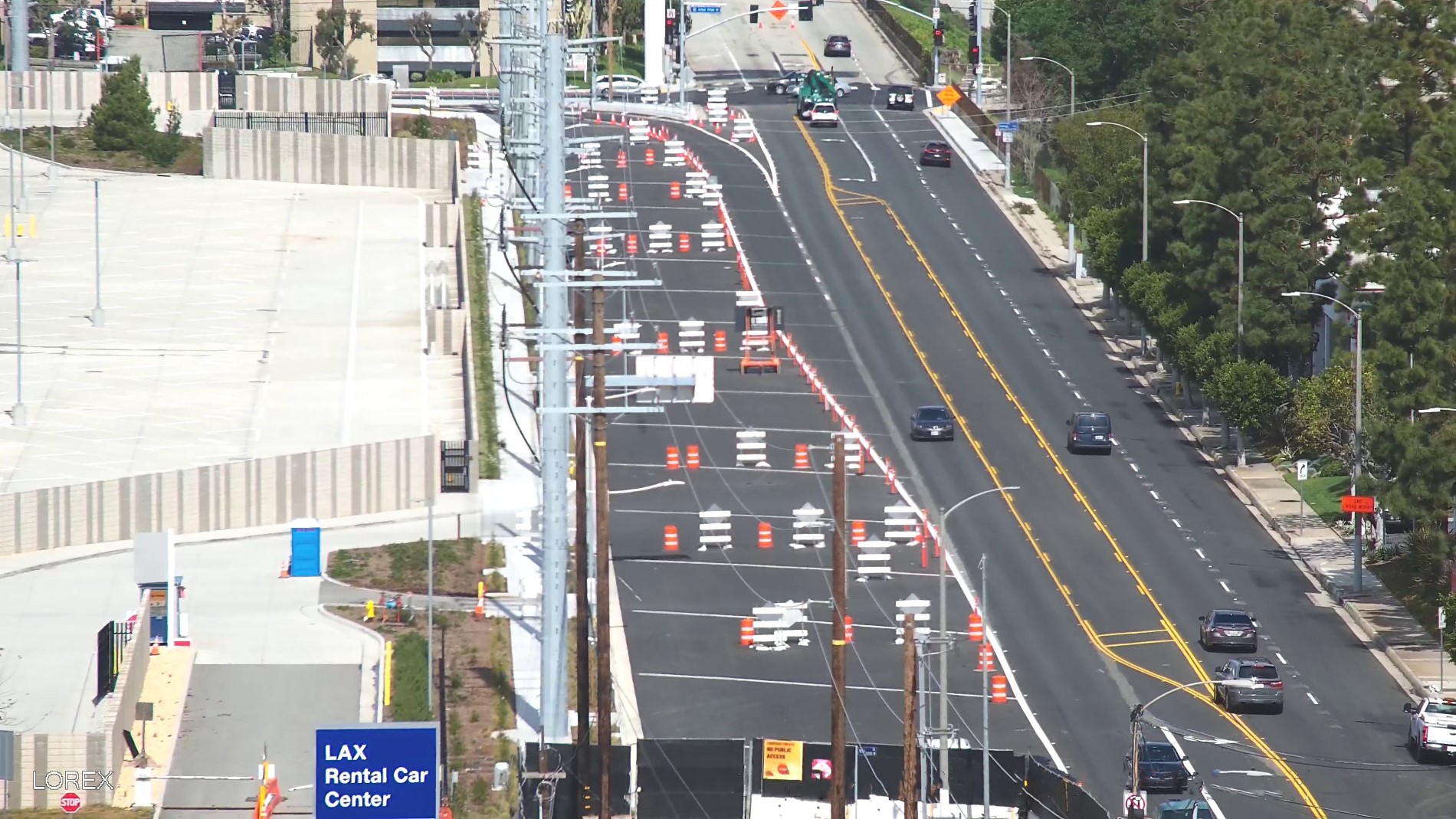 Street widening on La Cienega Boulevard along the eastern edge of the Consolidated Rent-A-Car facility property.